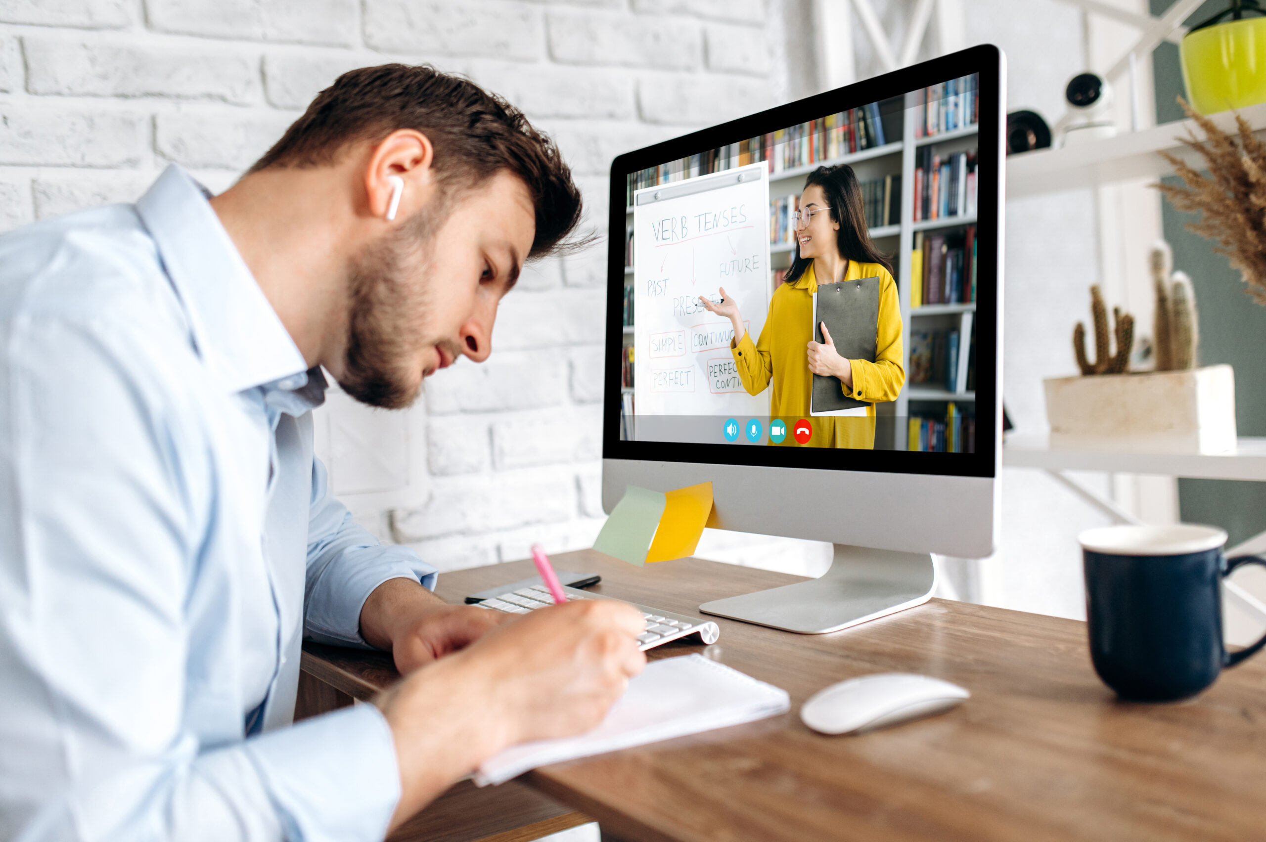 A student attending an online Hindi learning session with a tutor on a video call, representing Simply Hindi’s digital approach to bridging cultures through language.